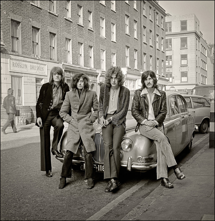 Led Zeppelin leaning on car, London, 1968