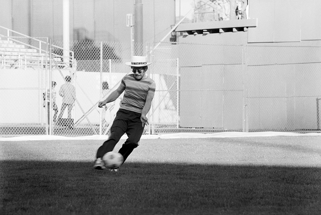 Elton John, Playing Football, Dodger Stadium, Los Angeles, CA, 1975 - Morrison Hotel Gallery