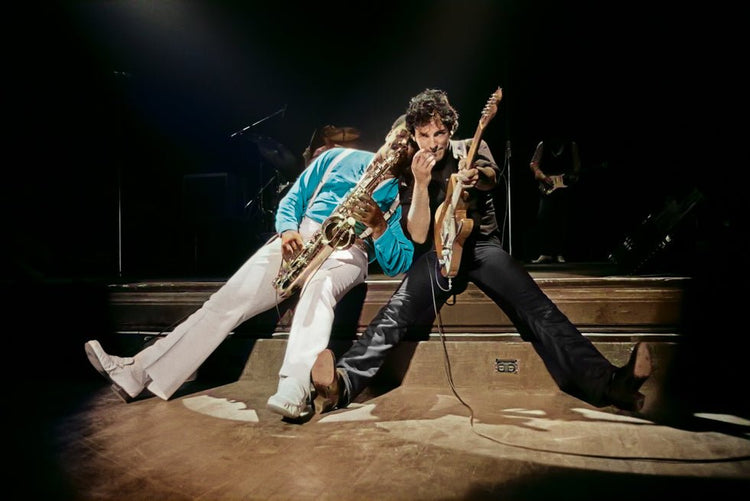 Bruce Springsteen and Clarence Clemons Sitting on Stage Performing, 1978 (Colorized) - Morrison Hotel Gallery