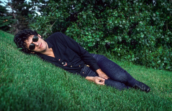 Bruce Springsteen, Laying in the Grass with Sunglasses, 1978 - Morrison Hotel Gallery