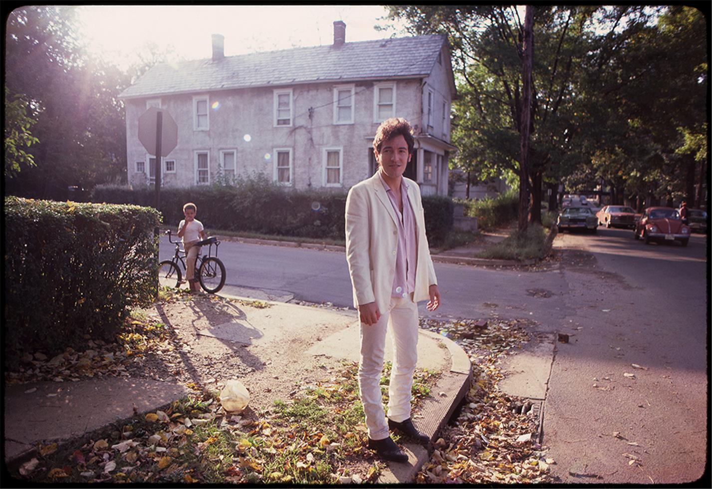 Springsteen At Home Bruce Springsteen, outside his childhood home, NJ, 1979