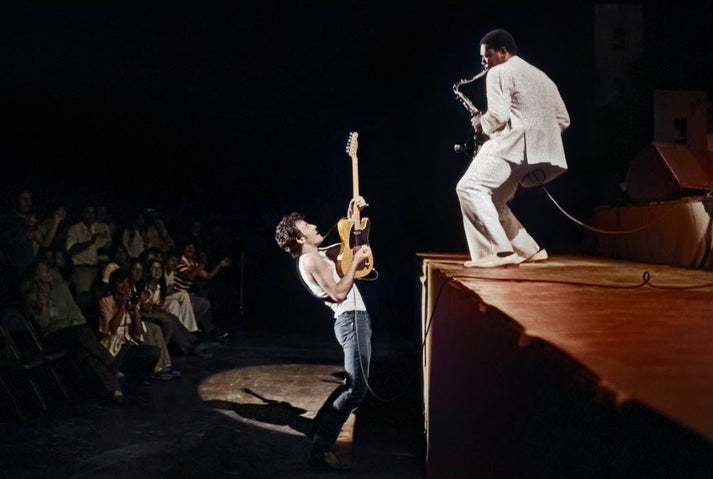 Bruce Springsteen Playing From the Crowd to Clarence Clemons on Stage,