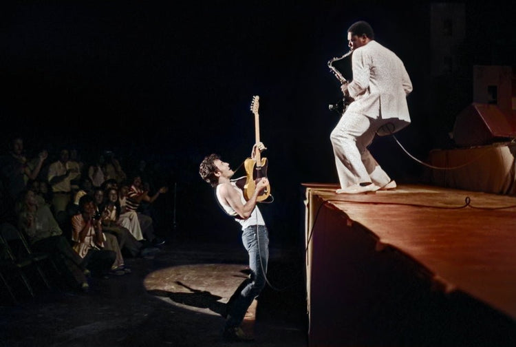 Bruce Springsteen Playing From the Crowd to Clarence Clemons on Stage, 1978 (Colorized) - Morrison Hotel Gallery