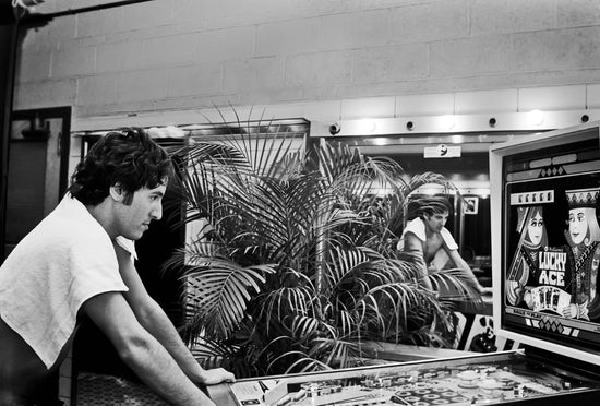 Bruce Springsteen Playing Pinball Machine Backstage, 1978 - Morrison Hotel Gallery