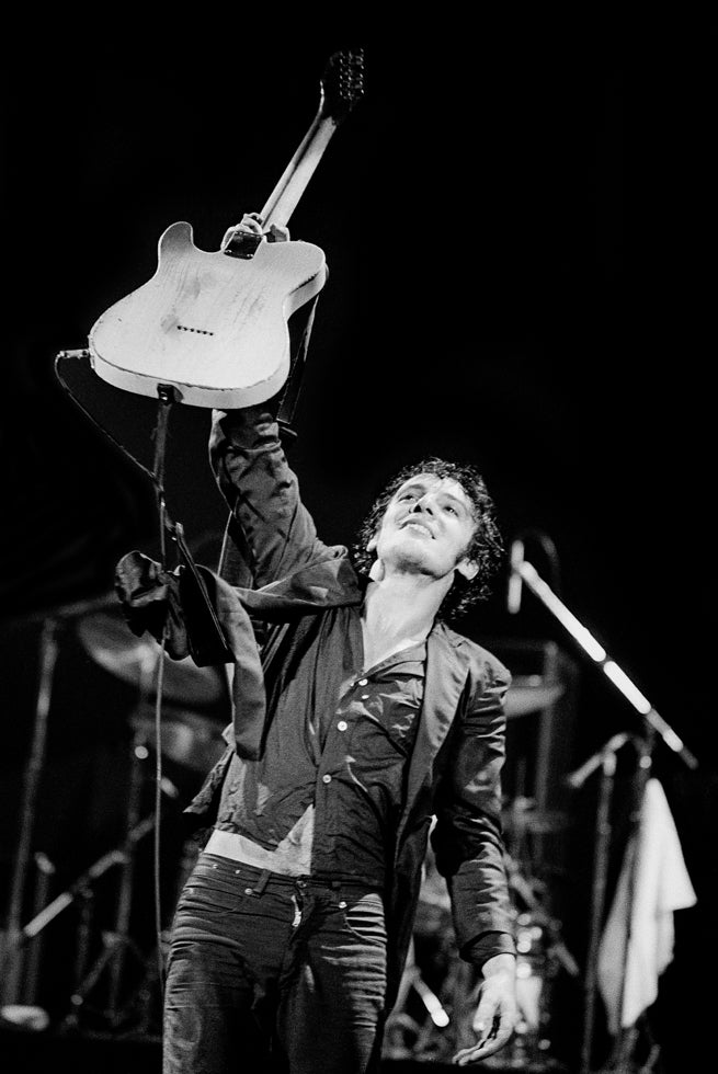 Bruce Springsteen Raising White Fender Telecaster in the Air, 1978 - Morrison Hotel Gallery