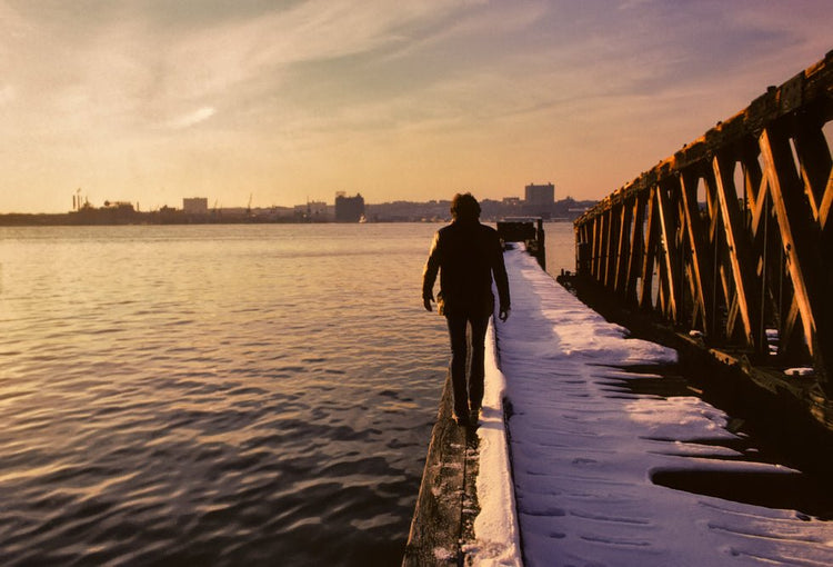 Bruce Springsteen Walking NYC Pier at Sunset, 1978 - Morrison Hotel Gallery