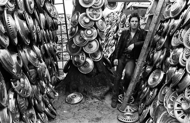 Bruce Springsteen with Hubcaps, Holmdel, New Jersey, 1978 - Morrison Hotel Gallery