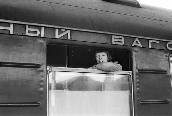 David Bowie, looking out of window of Trans Siberian Express, 1973 - Morrison Hotel Gallery