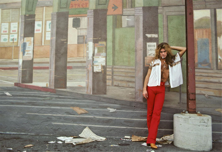 David Lee Roth standing next to a mural - Morrison Hotel Gallery