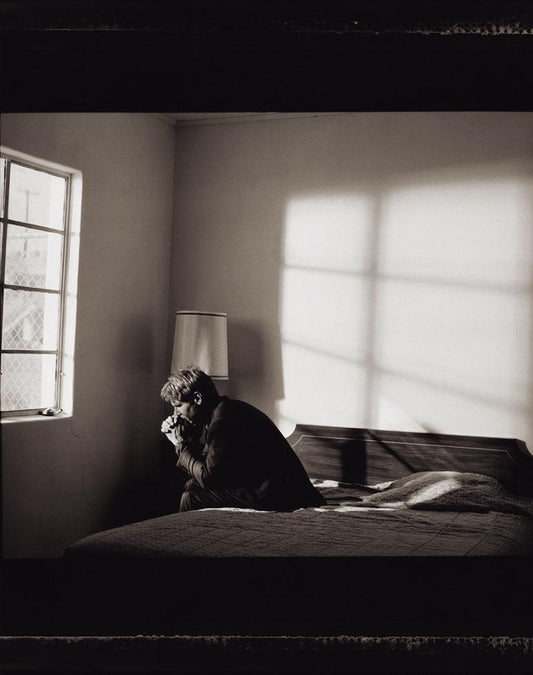 Harrison Ford (on bed), Amboy, CA, 2002 - Morrison Hotel Gallery