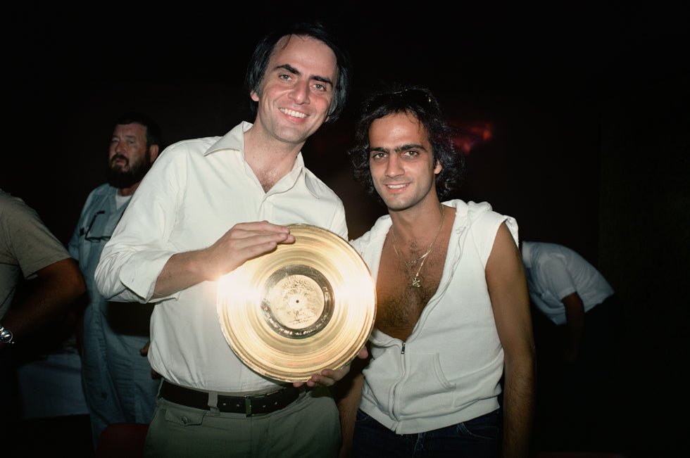 Jimmy Iovine and Carl Sagan with Voyager Golden Record, 1977 - Morrison Hotel Gallery