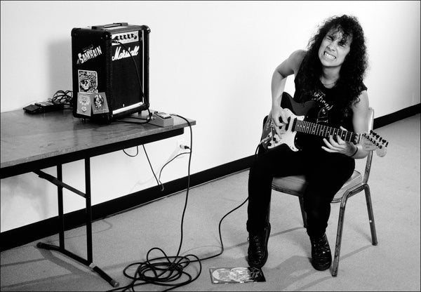 Kirk Hammett warms up backstage, Metallica, Damage, Inc. Tour 1986