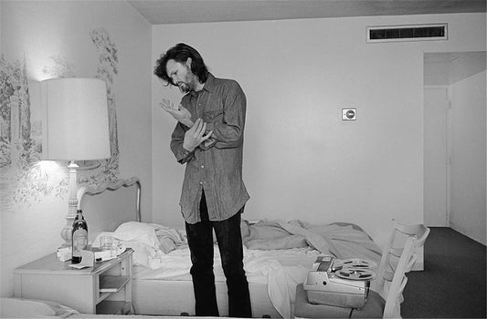 Kris Kristofferson, dressing in hotel room, circa 1970 - Morrison Hotel Gallery