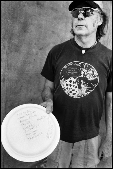 Neil Young, Holding Plate At Bonnaroo - Morrison Hotel Gallery