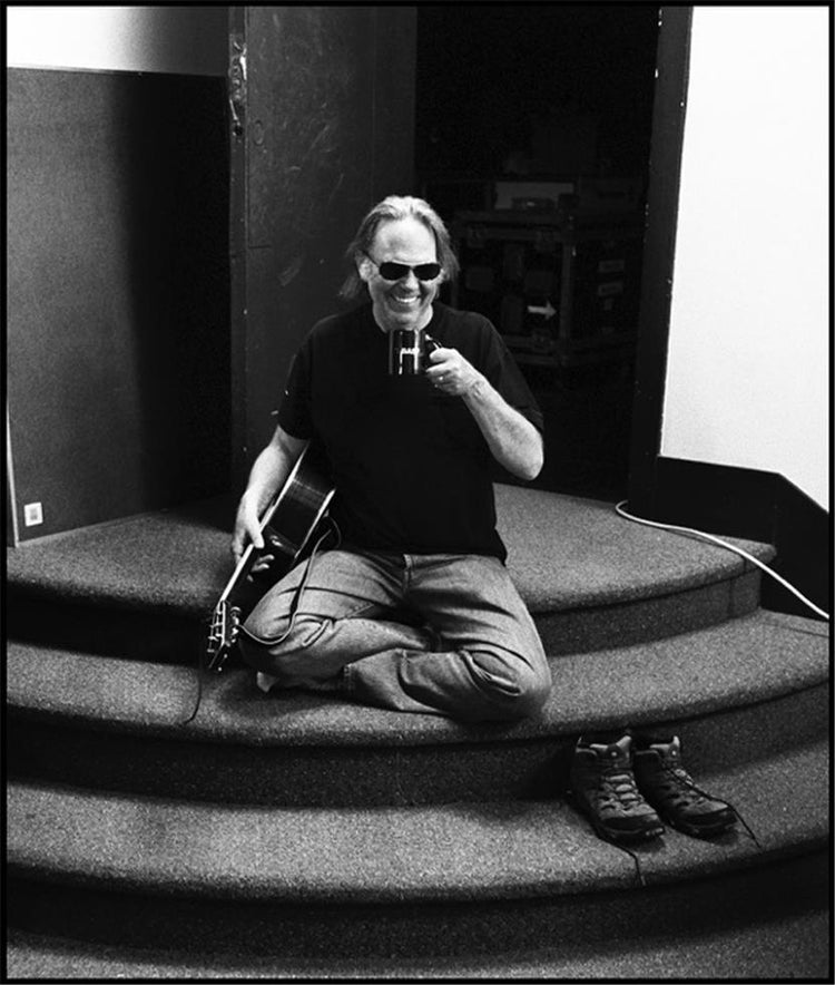 Neil Young, Sitting on stairs with cup of Tea - Morrison Hotel Gallery