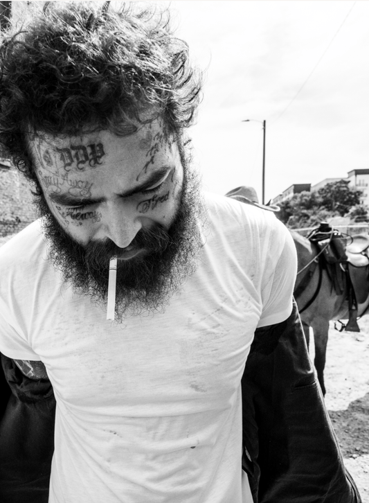 Post Malone, with Cigarette, Looking Down - Morrison Hotel Gallery