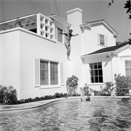 Rod Taylor jumping into his pool, Beverly Hills, CA 1961. - Morrison Hotel Gallery