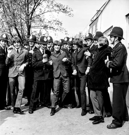 The Beatles surround themselves with Bobbies, April 24, 1965 - Morrison Hotel Gallery